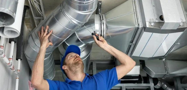 AC duct inspection service in Dubai checking duct system for dust.